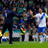Greece's Anastasios Bakasetas celebrates with manager Gus Poyet after scoring their side's goal during the UEFA Nations League match at Windsor Park: Brian Lawless/PA Wire.