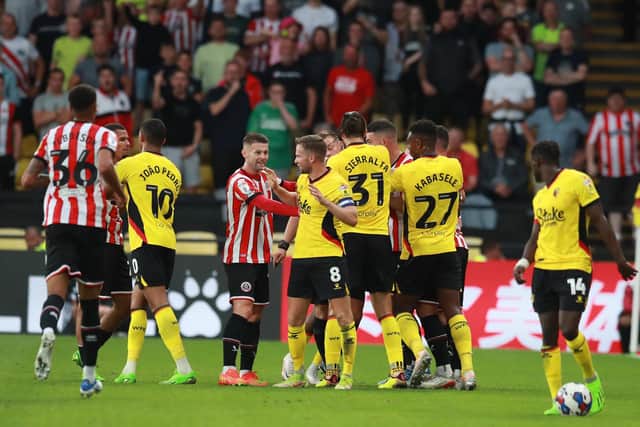 Watford, England, 1st August 2022. Watford and Sheffield Utd players clash during the Sky Bet Championship match at Vicarage Road, Watford. Picture credit should read: Simon Bellis / Sportimage