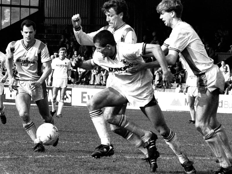 Steve Charles, Mark Kearney and Simon Coleman in action in the thrilling FA Cup tie with Wolves.