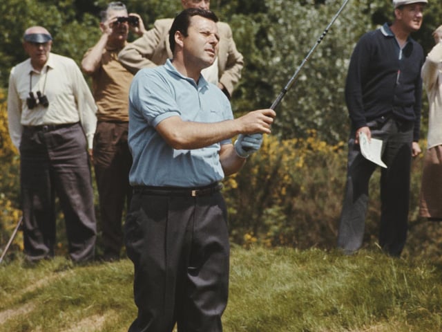 Peter Alliss plays an iron shot at the 1965 Piccadilly World Match Play Championship at Wentworth. Alliss, still the voice of golf for the BBC, won the PGA title twice, though not at Wentworth. His first victory came at Maesdu in Wales in 1957 and he won again eight years later at Little Aston.