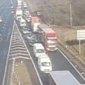 A man was killed near South Yorkshire in a crash which shut the M1 for several hours, say police. Picture shows police closing the road yesterday