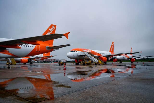 EasyJet lowcost airline aircrafts on the tarmac of the Humberto Delgado airport in Lisbon on April 9, 2020. (Photo by PATRICIA DE MELO MOREIRA/AFP via Getty Images)