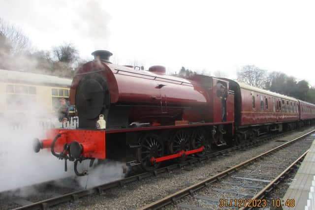 All aboard the nostalgia express: 80-Year-Old 'Austerity' locomotive steams into Ecclesbourne Valley Railway.