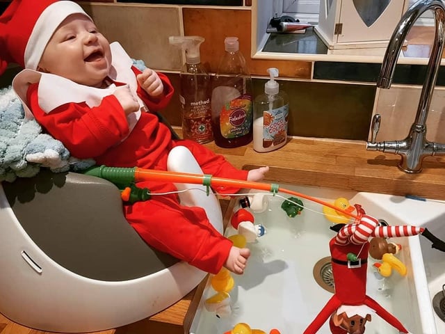 Bubbles gets her own back on her naughty elf this morning, using her uncle Tim's fishing rod.
