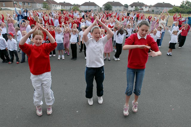 Pupils Holly Ridley, Hannah Burke and Amy Taylor lead the 'Wake Up and Shake Up' session in 2006. Remember this?