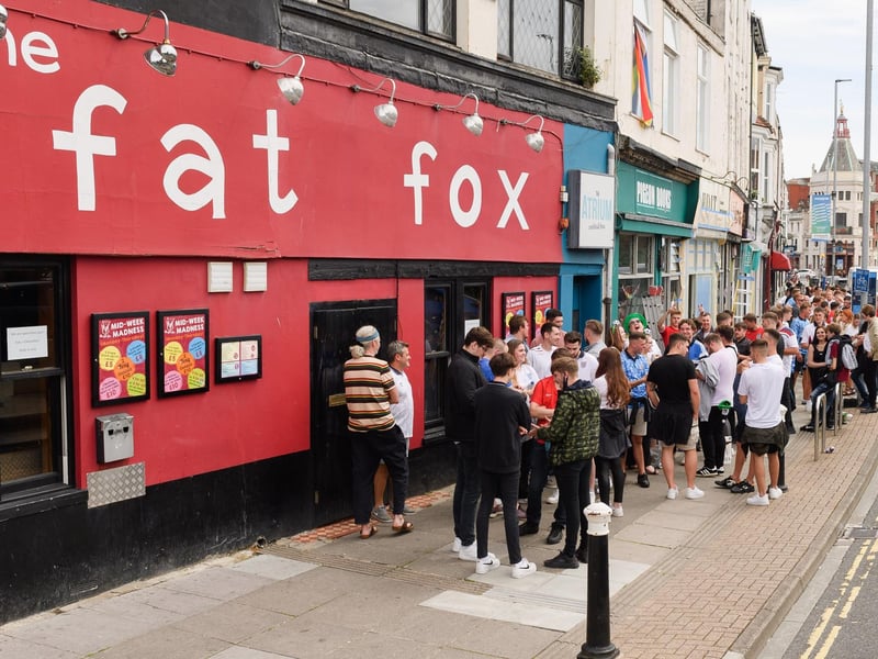 Pictured is: England supporters gather outside The Fat Fox pub ahead of the England v Italy Euro 2020 cup final. Picture: Keith Woodland (110721-15)