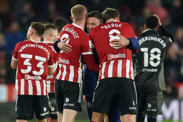 Sheffield United manager Paul Heckingbottom with Oliver McBurnie and Sander Berge following victory over Blackburn Rovers: Mike Egerton/PA Wire.