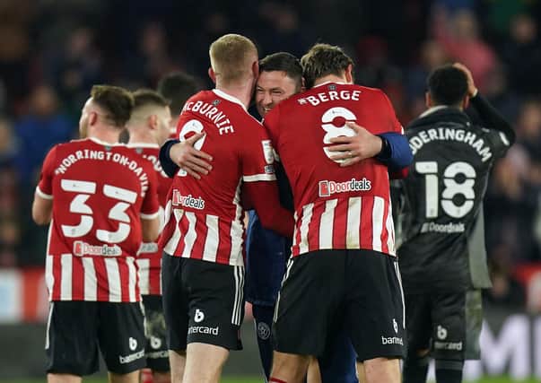 Sheffield United manager Paul Heckingbottom with Oliver McBurnie and Sander Berge following victory over Blackburn Rovers: Mike Egerton/PA Wire.
