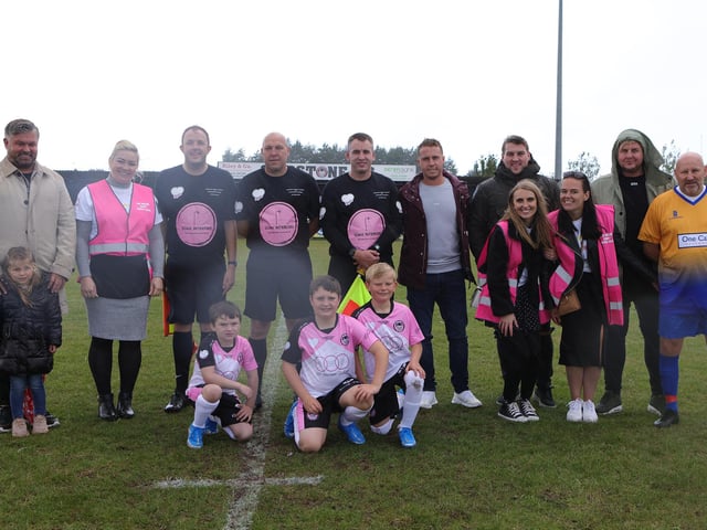 Sponsors for the match line up, pictured with the officials.