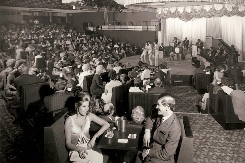 Fiesta-goers enjoying a cabaret night - and no doubt chicken or scampi in a basket