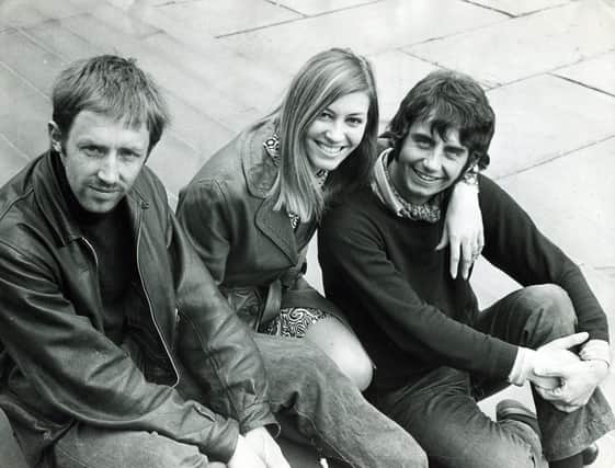 Three members of the Sheffield Playhouse, Townhead Street, are leaving Sheffield at the end of the current season... our picture shows the three relaxing on the City Hall steps, left to right, Christopher Wilkinson, Myra Frances, and Barrie Smith, June 12, 1968