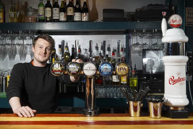 Joe Glover behind the bar at Early Bar. Picture: Scott Merrylees