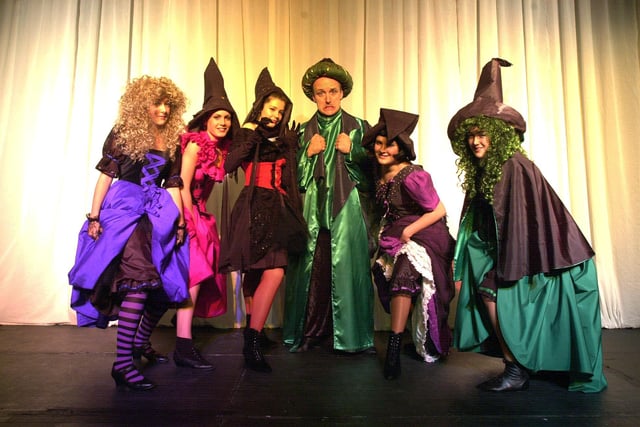 The Footloose Theatre Dance Academy presented It's a Kind of Magic in 2001. Our picture shows wizard Anthony Hallett, aged 23, with eveil witches, from left, Jade Thomas, aged 17, Kimberley Cheesewright, aged 16, Jenny Kirk, aged 15, Kathryn Wilford, aged 14, and Lauren Cheesewright, aged 16.