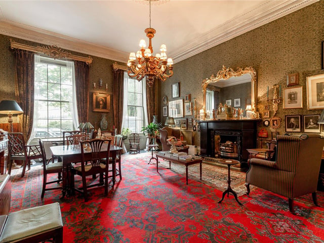 The house is described as "beautifully proportioned" and boasts five bedrooms, four bathrooms and three lounge areas such as the sitting room and the drawing room