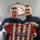 Filip Uremovic arrives at Sheffield United and is joined by manager Paul Heckingbottom