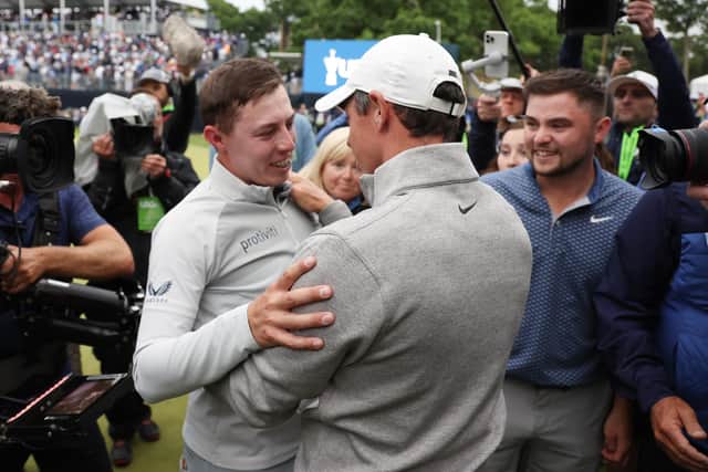 BROOKLINE, MASSACHUSETTS - JUNE 19: (L-R) Matt Fitzpatrick of England is congratulated on his win by Rory McIlroy of Northern Ireland as he walks off the 18th green during the final round of the 122nd U.S. Open Championship at The Country Club on June 19, 2022 in Brookline, Massachusetts. (Photo by Rob Carr/Getty Images)