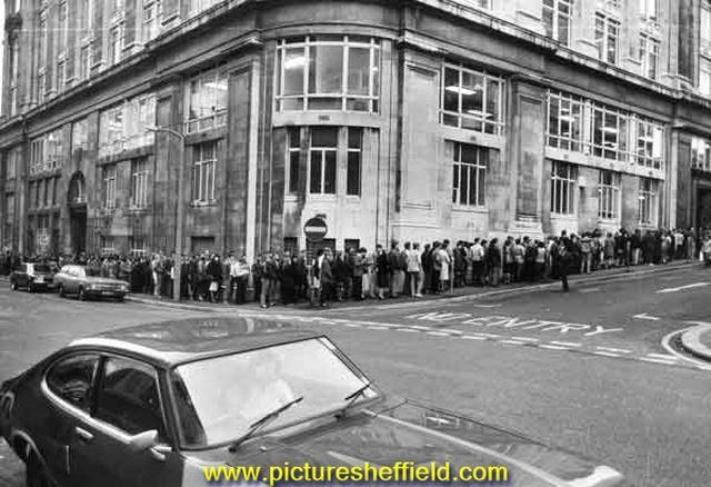 Queue for jobs at the Job Centre, (formerly Barclays Bank),Telephone Buildings, as seen from the corner of Pinfold Street and Holly Street 1983