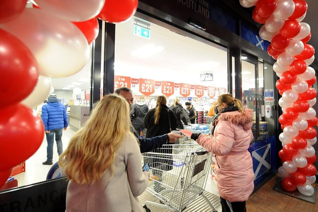 The  first customers through the door at 8:00am this morning (Pic: Fife Photo Agency)