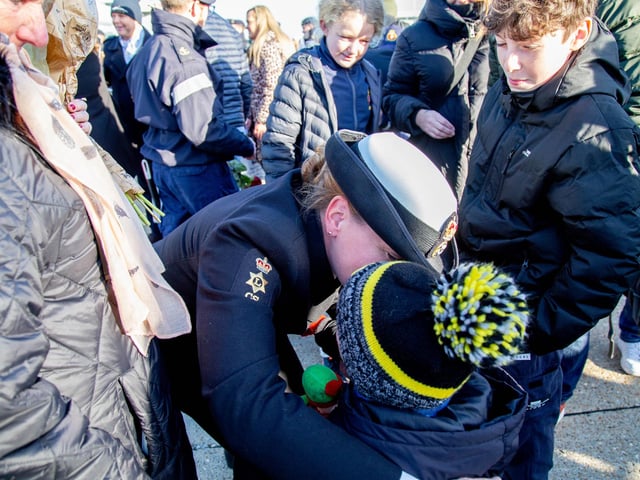 Crew members embrace family as they step off HMS Diamond. Picture: Habibur Rahman