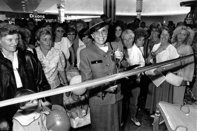 Sheila Gray of Handsworth cutting the ribbon at Meadowhall on September 4 1990.