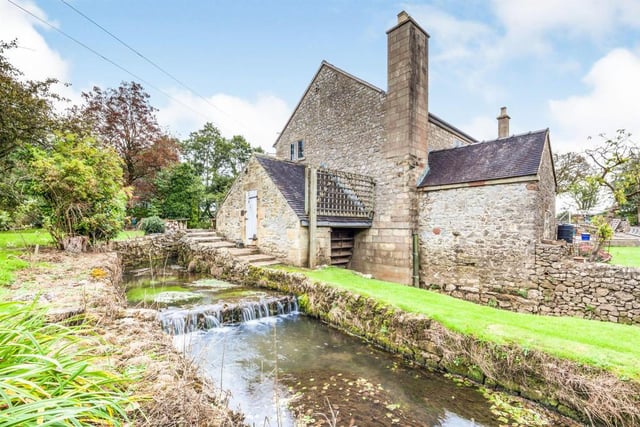 A period limestone detached former mill of substantial proportions incorporating a water wheel and additional accommodation within a detached two storey annex. Marketed by  Bagshaws Residential, 01335 680007.