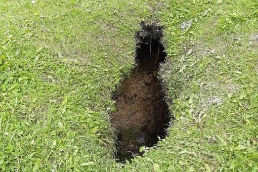 The deep sink hole that has opened up in Arbourthorne.