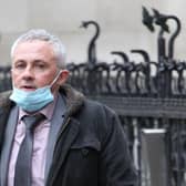 Pictured outside the High Court is former RF man Mark Mather, from Sheffield, who has filed a £4.9m claim against the MoD, claiming that exposure to paint and strippers left him 'high' and caused his multiple sclerosis