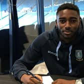 Josh Dawodu signing his first professional contract at Sheffield Wednesday in 2018. (via swfc.co.uk)