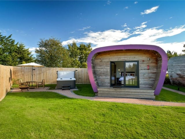 Two of the pods include a hot tub.