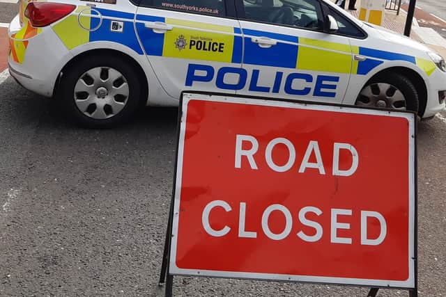 A major road on the Sheffield – Barnsley border has been closed tonight after a multi-vehicle car crash. File picure shows a South Yorkshire Police road closure