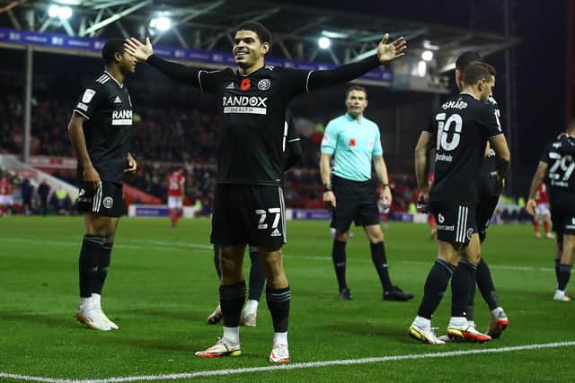 Morgan Gibbs-White celebrates his goal in front of the Sheffield United fans at Nottingham Forest: Simon Bellis / Sportimage