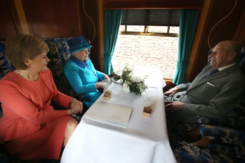 First Minister of Scotland Nicola Sturgeon, Queen Elizabeth II and Prince Philip, Duke of Edinburgh on board the steam locomotive 'Union of South Africa' on the day she becomes Britain's longest reigning monarch on September 09, 2015 in Edinburgh, Scotland.