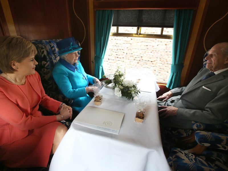 First Minister of Scotland Nicola Sturgeon, Queen Elizabeth II and Prince Philip, Duke of Edinburgh on board the steam locomotive 'Union of South Africa' on the day she becomes Britain's longest reigning monarch on September 09, 2015 in Edinburgh, Scotland.