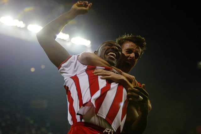 Wayne Allison celebrates with Michael Tonge after scoring the second goal in a 2-0 win over Sunderland in the Worthington Cup fourth round at Bramall Lane in December 2002.