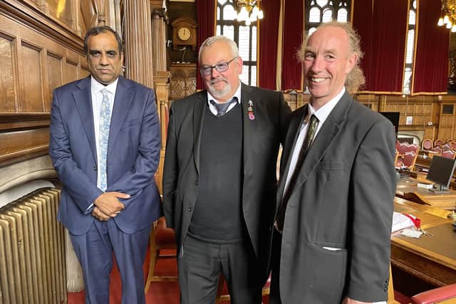 Councillors Shaffaq Mohammed (Liberal Democrats leader), Terry Fox (Labour leader) and Douglas Johnson (Green Party leader) in Sheffield Town Hall council chamber after the vote.