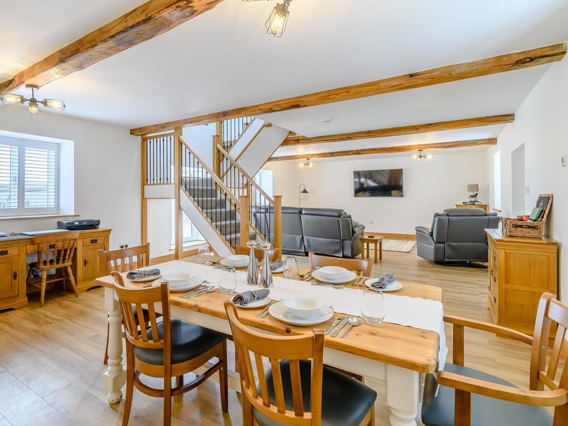 The classy and comfortable dining area in the current main home at Warren Farm. The home is ideal for a family.