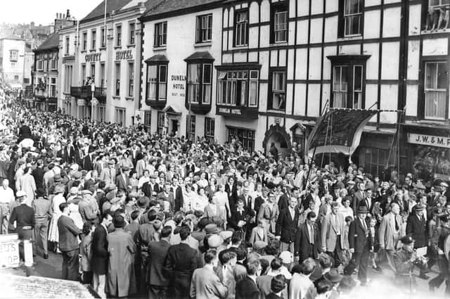 Boldon Colliery miners and their families, with the lodge banner marching through Durham City 62 years ago.