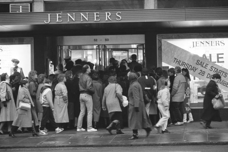 The first day of Jenners winter sale in Decemmber 1989 - crowds rush into the famous Edinburgh department store as the doors open at 9.00am.