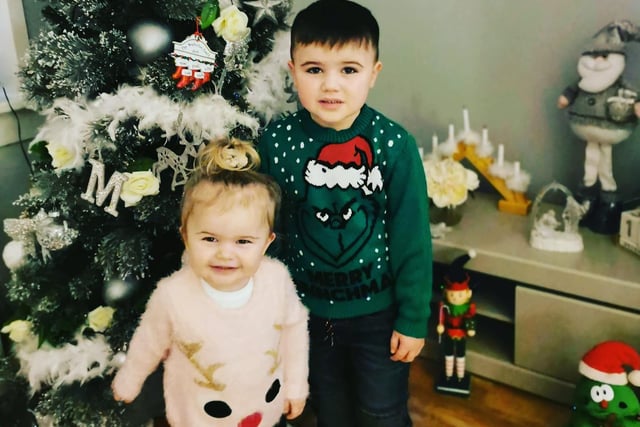 Luke, age 4, and Layla, age 2, kitted out in their festive knitwear.