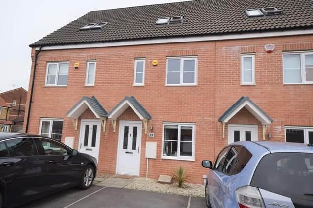 A very stylish and modern three double bedroom mid town house set over three floors offering excellent living accommodation situated within this popular development on the outskirts of Harworth.