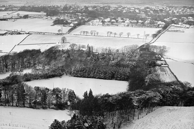 A snow covered Colinton, looking towards Bonaly Tower from the Pentlands, in January 1958.