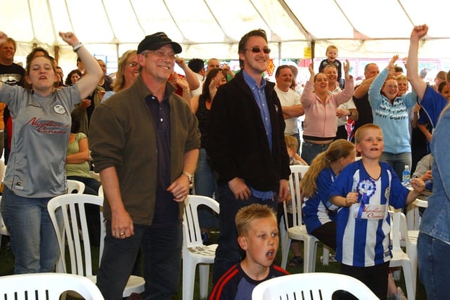 Sheffield Wednesday fans celebrate the team's play-off glory while at Mayfest
