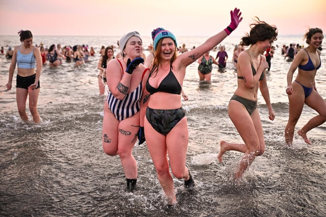 Around 700 swimmers took a sunrise dip in the North Sea at Portobello Beach.  (Photo by Jeff J Mitchell/Getty Images)