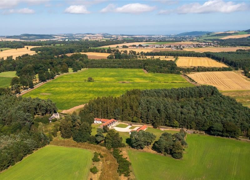 Aerial view of property and surrounding area.