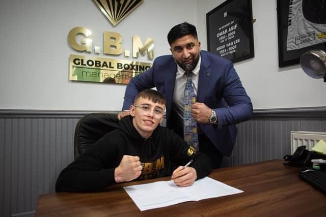 Owen Durnan, left, who took up boxing after being bullied at school, pictured with Izzy Asif