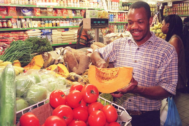 Pictured at Grant's Groceries stall, Castle Market, Sheffield, seen is Herold Grant slicing pumpkin in 1999