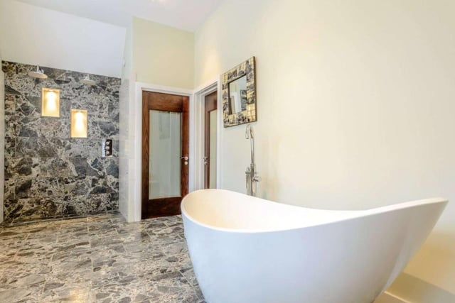 The property features a total of three bathrooms, with the master ensuite offering a large, cleverly designed and elegant space, with a peapod bath and two showers.
