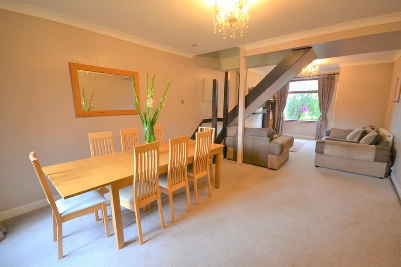 Open plan dining/lounge separated by a turning wooden staircase leading to the first floor.
With wooden double glazed French doors open to the rear garden, there is a useful storage cupboard and a further wooden glazed door gives access to the kitchen.