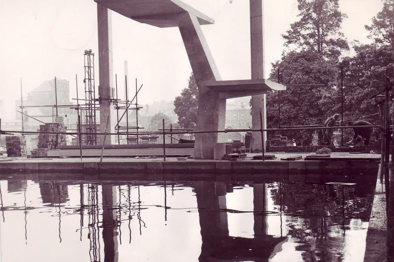 August 15, 1968: The diving board is firmly in position but the water was rather murky as the building of the new swimming pool at Queen's Park sports centre continued.