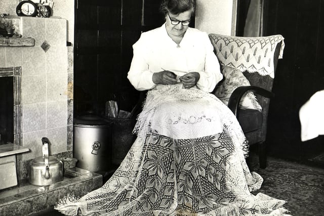 An old Brampton, Chesterfield, woman, Mrs. Marguerite Ivy Smith of "Highland Cottage" spent her leisure hours making knitted Venetian lace articles